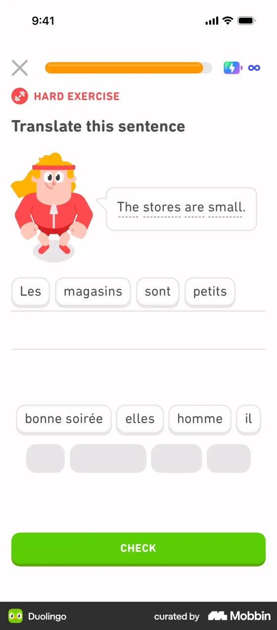 Duolingo French exercise labelled HARD EXERCISE: translate "The stores are small." by tapping word tiles. The answer Les magasins sont petits is built from tiles, with spare tiles below.
